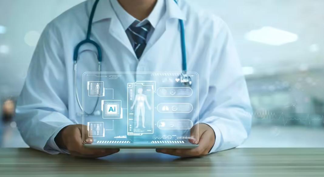 Doctor reviewing medical reports with stethoscope and laptop