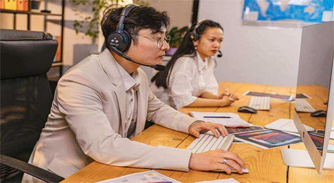 Japanese office workers and foreign employees collaborating in a modern workplace, symbolizing Japan’s job market