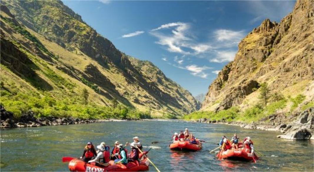 Adventurers hiking, rafting, and exploring thrilling destinations