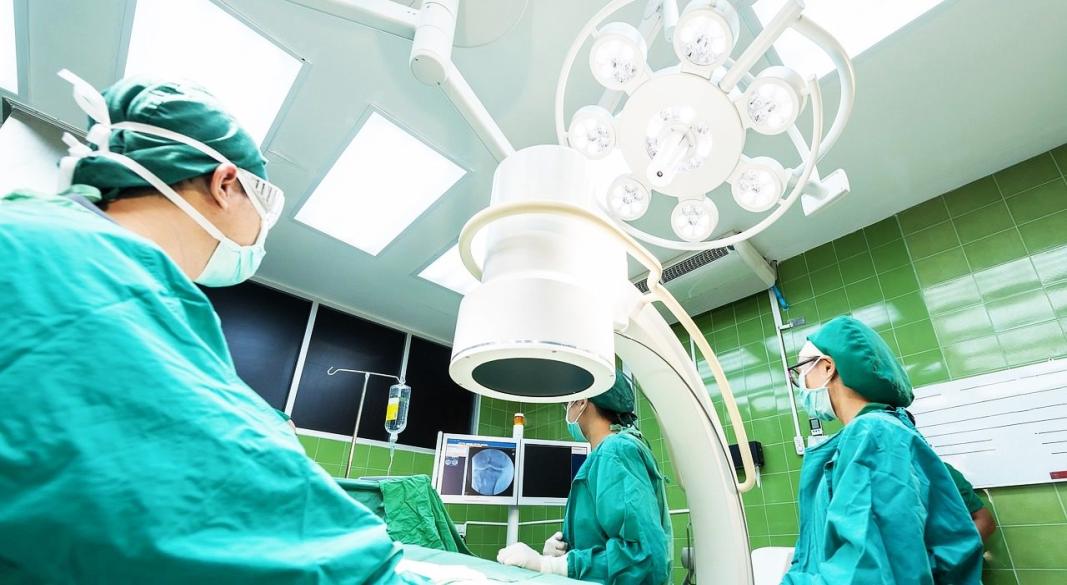 Between Universal Coverage and System Strain