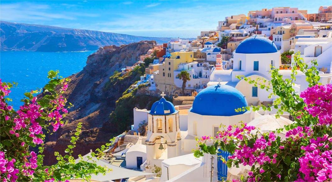 Scenic view of Santorini Greece with blue domes and sea