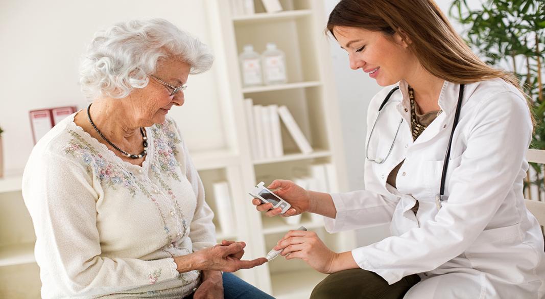 Healthcare professional reviewing diabetes management plan with a patient
