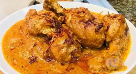 “Delicious traditional chicken roast served with spices and herbs”