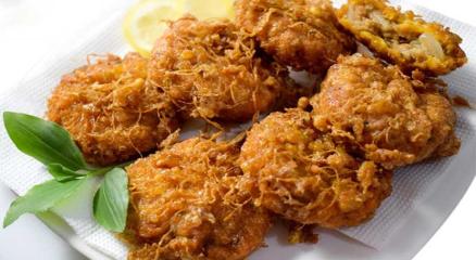 Traditional Jali Kabab with crispy egg net covering