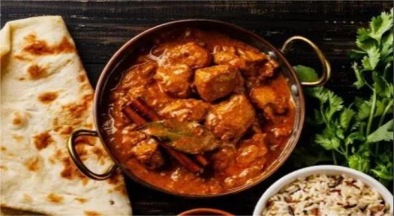 Authentic Indian Curry Served in a Bowl with Spices