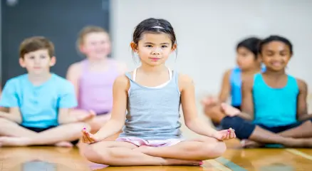Student and athlete practicing mindfulness to overcome performance anxiety