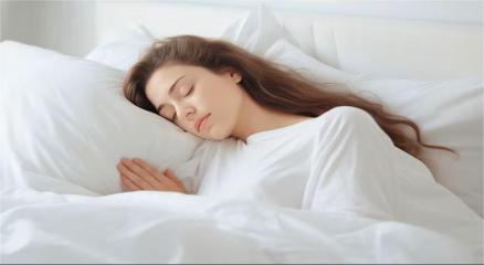 Person sleeping peacefully in a calm, cozy bedroom