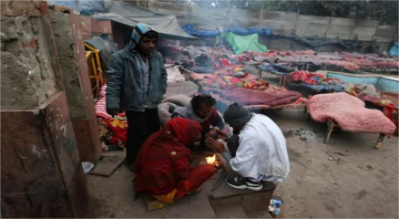 "Severe winter in India 2025 with foggy streets and people bundled in warm clothes due to La Niña effect"